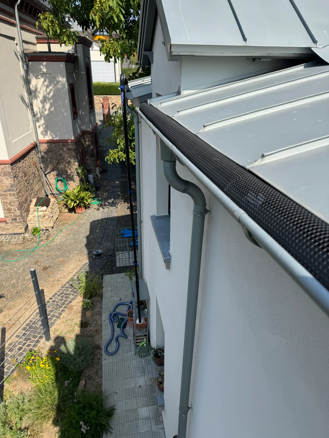 Dachrinnenreinigung von oben RELTRO